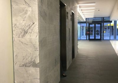Tile flooring installation on pathways and walls
