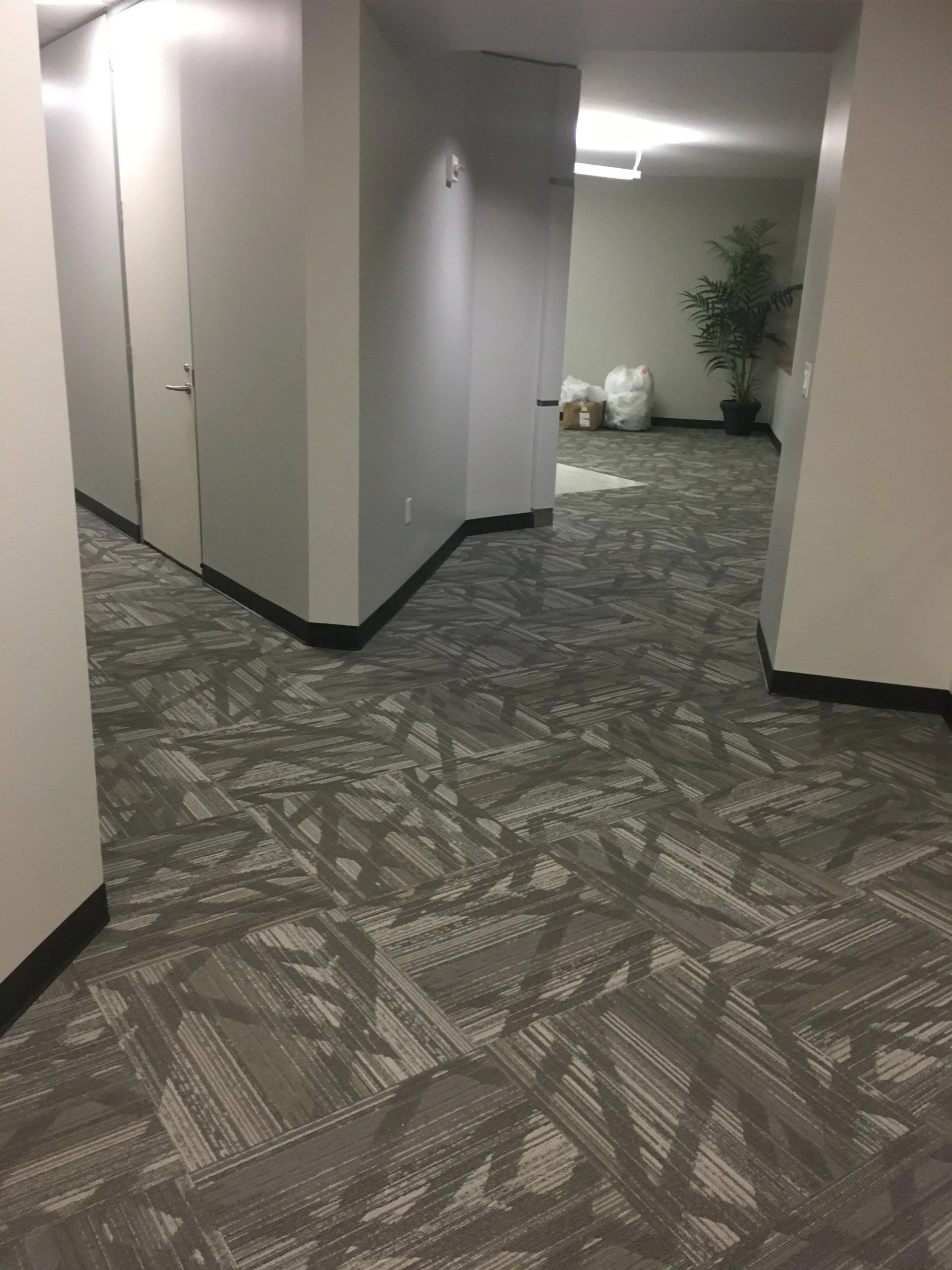 tile floor installation-hotel room pathway